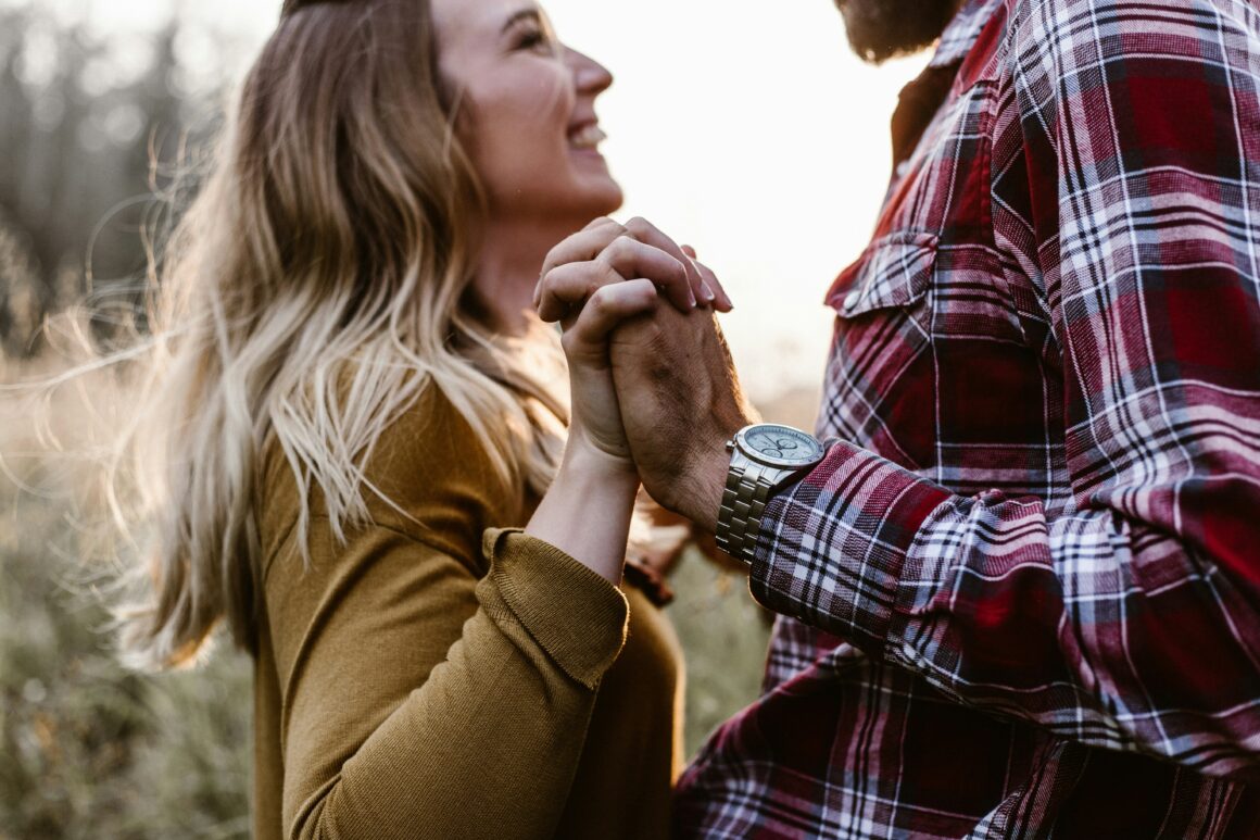 man and woman holding hands 10 Clear Signs That You Have an Unexplainable Connection With Someone